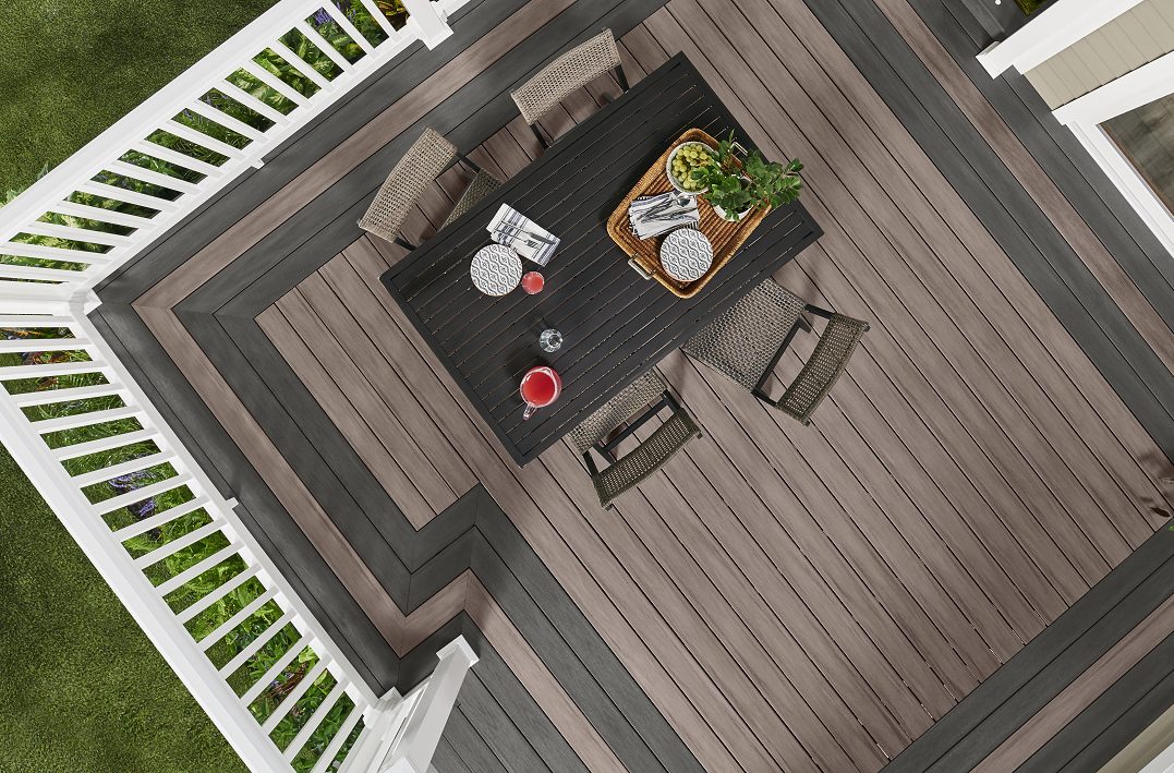 Overhead shot of a deck with a table and chairs.